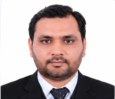 Portrait of Muzammal Hussain in formal attire